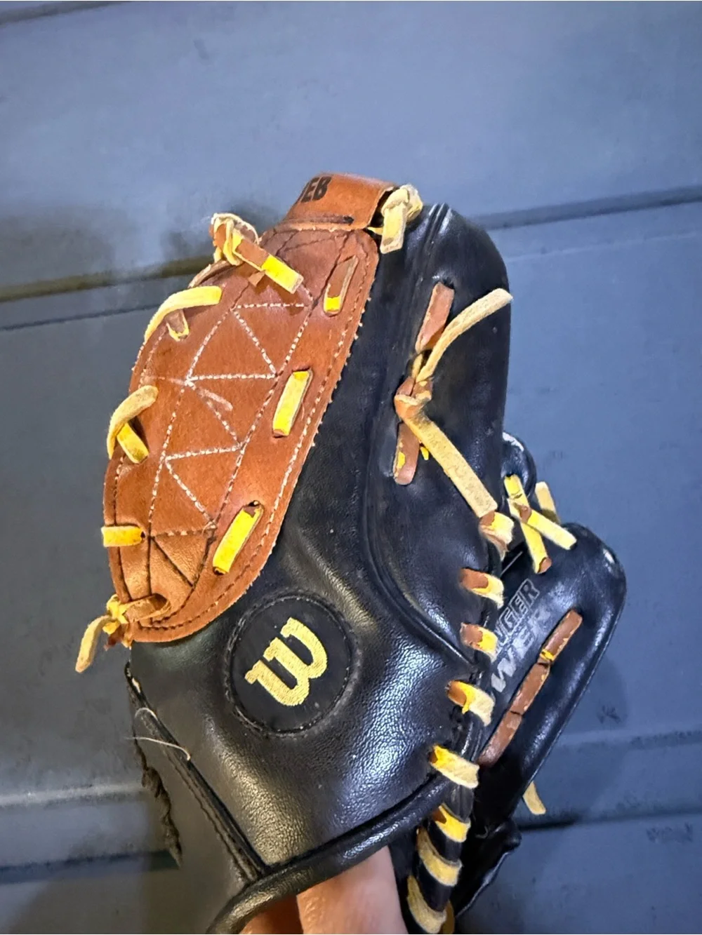 Wilson Kids Black and Tan Baseball Glove with Yellow Laces